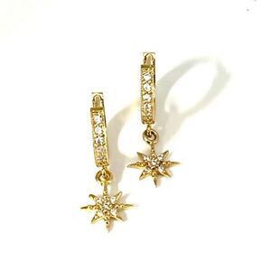 Gold huggie hoops with celestial gold stars great for everyday or gift for her